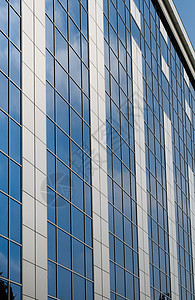 现代办公楼窗格办公室天空窗户建筑学城市镜子反射蓝色边界图片