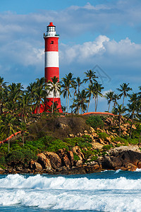 KovalamVizhinjam灯塔 印度喀拉拉岩石波浪海景风暴棕榈海洋天气图片