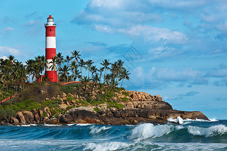 KovalamVizhinjam灯塔 印度喀拉拉棕榈天气风暴海洋岩石海景波浪图片