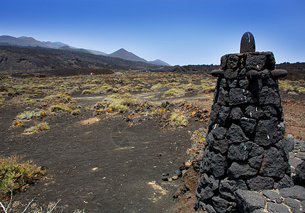La Palma熔岩石栅栏柱岛屿栅栏干旱土地天空旅游火山旅行岩石沙漠图片