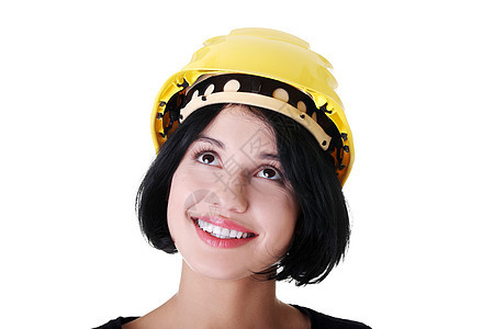 戴头盔的自信女性工人抬头寻找建筑师建筑学商务女性公司工作人士安全建设者企业家图片