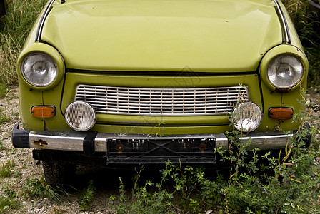 汽车车车辆历史床单身体头灯金属绿色发动机猪蹄技术背景图片