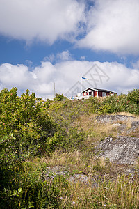群岛旅行小岛花岗岩房屋房子蓝色建筑树木天空岩石图片