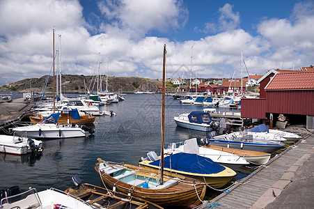 瑞典哈韦克斯特兰岛屿房子船屋渔船小屋蓝色岩石小岛天空旅行图片