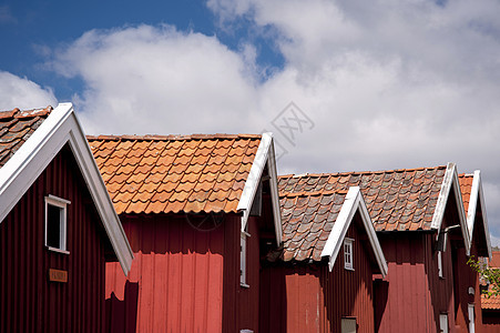瑞典哈韦克斯特兰岩石蓝色小屋渔村旅行小岛渔船树木村庄岛屿图片