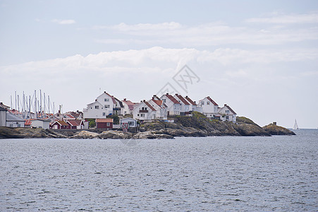 瑞典阿斯托尔建筑钓鱼小屋蓝色岛屿房屋海岸航行渔村帆船图片