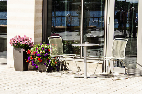 户外咖啡厅装饰早餐玻璃餐厅花朵风格座位桌子奢华用餐图片