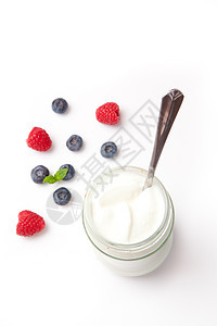 酸奶和浆果勺子食物覆盆子营养甜点水果白色图片