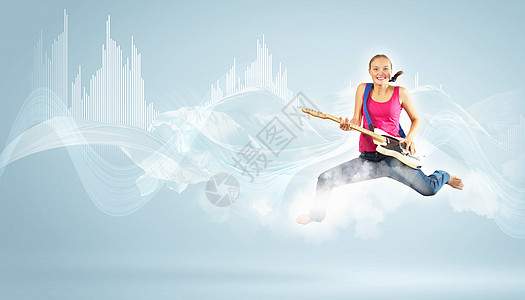 女青年玩电吉他和跳跳乐器女士男生音乐家蓝调低音岩石乐队舞蹈空气图片