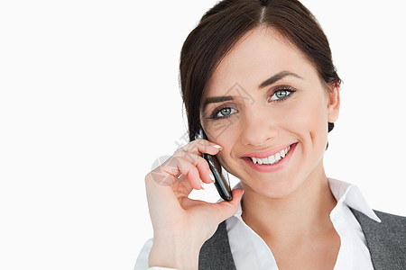 使用电话的开心女商务人士快乐西装工人呼唤人士女性微笑棕色女士商务图片