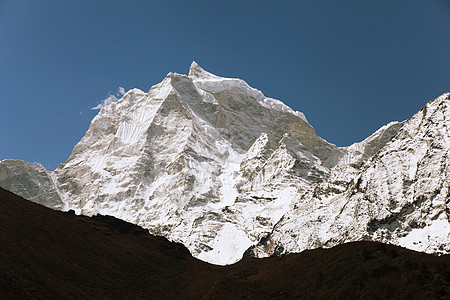 雪雪山天空冰川蓝色旅行顶峰爬坡远足山峰活动岩石图片