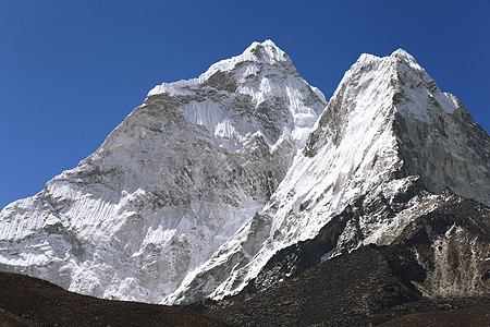 雪雪山蓝色岩石远足爬坡天空山峰活动全景冰川顶峰图片