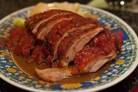 蜂蜜烤鸭 菜盘上中式家禽香料洋葱主菜皮肤烹饪蜂蜜鸭子红色美食图片