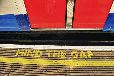 留心缺口 警告伦敦地下的地铁城市边缘蓝色运动旅行交通脚本安全平台管子图片