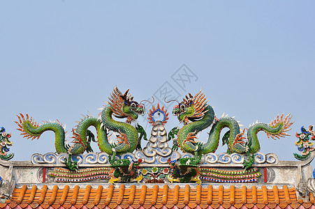龙雕像艺术文化金子装饰品宗教财富动物建筑学传统雕塑图片
