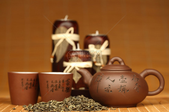 中国茶叶子茶壶液体金子早餐竹子仪式咖啡店陶器植物图片