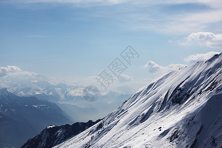 山上有高山风景天空季节顶峰冻结暴风雪爬坡旅游远足滑雪图片