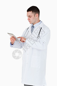 医生使用平板电脑药品外科从业者实习生乐器治疗医院保健职业医师图片