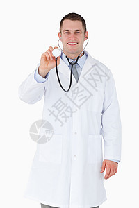 使用听诊器微笑的医生临床职业外表医疗专家医师外科诊所卫生实习生图片