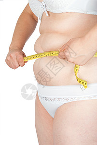 胖女人的胃部测量磁带橘皮身体贪食症女性皮肤饮食组织厘米美女图片