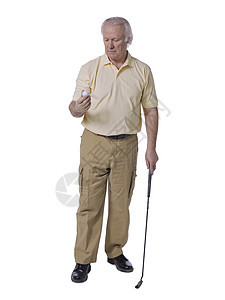 持有高尔夫球的老人高尔夫球手图片