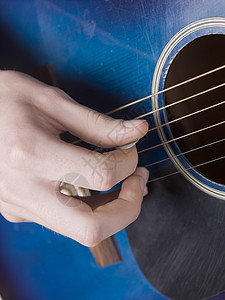 弹吉他歌曲男人爵士乐乐器教训旋律吉他蓝色音乐会演员图片
