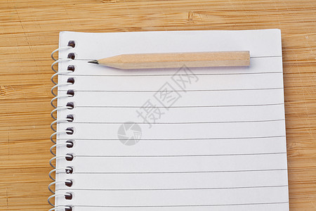 笔记本和铅笔写作边界橡皮工具绘画床单学校草稿环境螺旋图片