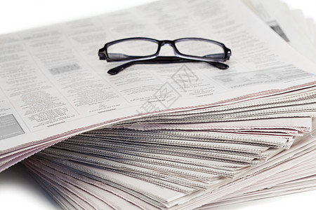 报纸和黑眼镜眼镜标题文档工作阅读杂志历史邮政记者新闻业图片