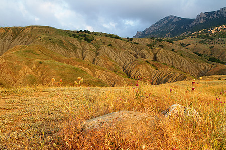 美丽的山地景观土壤风景晴天旅行天空爬坡石头太阳阳光黄色图片