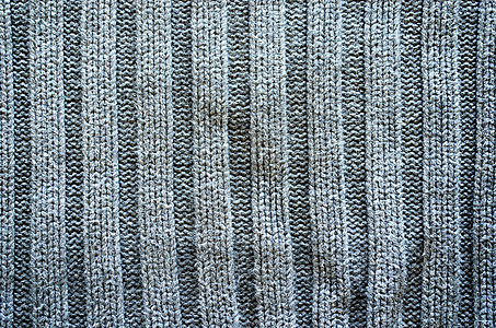 Grey knit 羊毛垫缝合布料背景宏观灰色材料手工纺织品织物针织毛衣装饰棉布图片