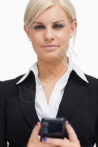 拥有手机的女商务人士电话生意人人士拨号管理人员女士金发套装浅色女性图片