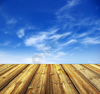 蓝蓝天空和木地板背景园艺阳光院子草本植物墙纸叶子植物木头公园太阳图片