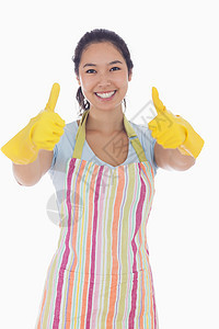 快乐的女士用橡胶手套给人拇指图片