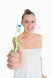 带牙刷的开心女人图片