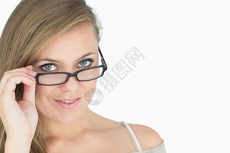 带着眼镜微笑的女人长发快乐头发浅色女性金发女郎女士倾斜眼睛金发图片