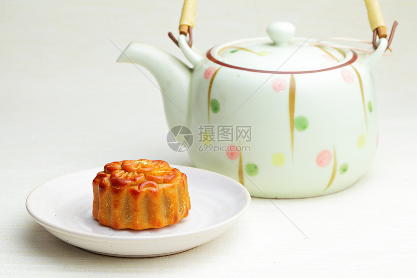 中国中日秋节的月饼仪式土制月亮蛋糕美味烹饪厨房茶壶黏土食品图片