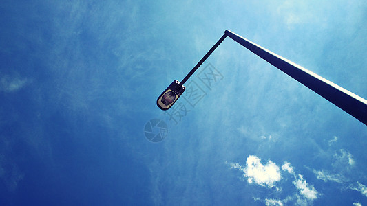 蓝色天空的街道灯路灯纪念碑金属电气力量城市灯柱玻璃照明活力图片