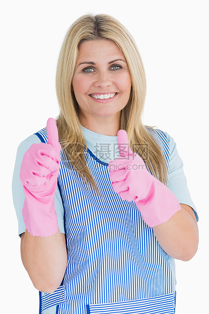 用粉色手套把拇拇指放在更清洁的地方图片