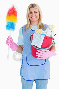 清洁女工拿着用桶装的羽毛散花器图片