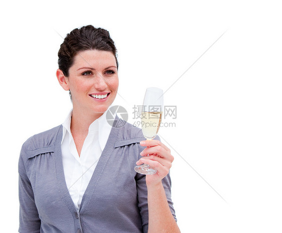 一个微笑的女商务人士 喝香槟的肖像图片