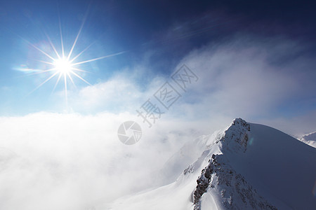 平面顶部暴风雪蓝色爬坡运动高山冻结旅游冰川顶峰季节图片