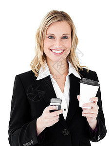 拥有咖啡并使用手机的漂亮女商业家妇女图片