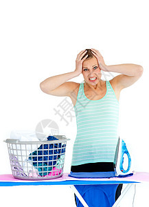 熨烫妇女家庭衬衫洗衣店情绪器具女士木板白色温暖篮子图片
