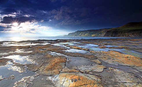 海湾波浪天空海浪蓝色岩石目的地旅游海滩旅行风景图片