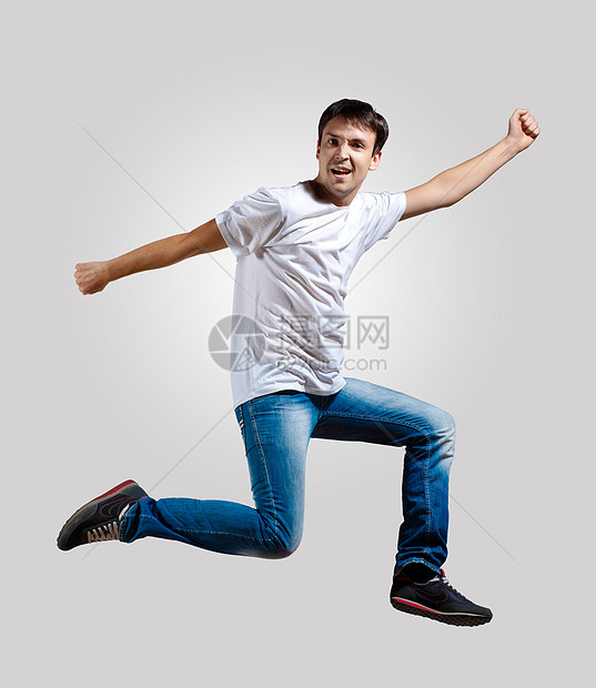 青年男子跳舞和跳跃运动成人霹雳舞者艺术霹雳舞舞蹈家体操杂技演员行动图片