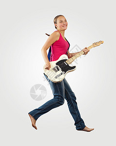 女青年玩电吉他和跳跳吉他手空气电气低音旋律艺术家男生流行音乐舞蹈自由图片