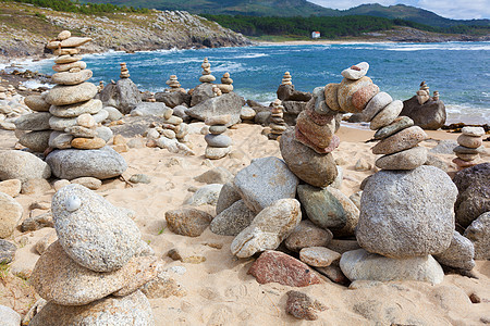 西班牙加利西亚拉科鲁阿附近的海滩晴天石头旅行旅游海洋珊瑚岩石图片