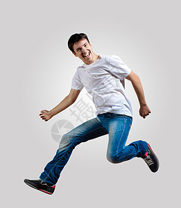 青年男子跳舞和跳跃体操男生有氧运动杂技艺术演员运动派对姿势男性图片