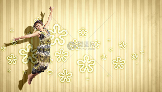 年轻女子跳舞跳跃女孩体操姿势艺术工作室杂技演员灵活性女性运动图片