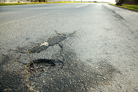 坑洞衰变危险风化路面休息街道侵蚀裂缝损害质量图片